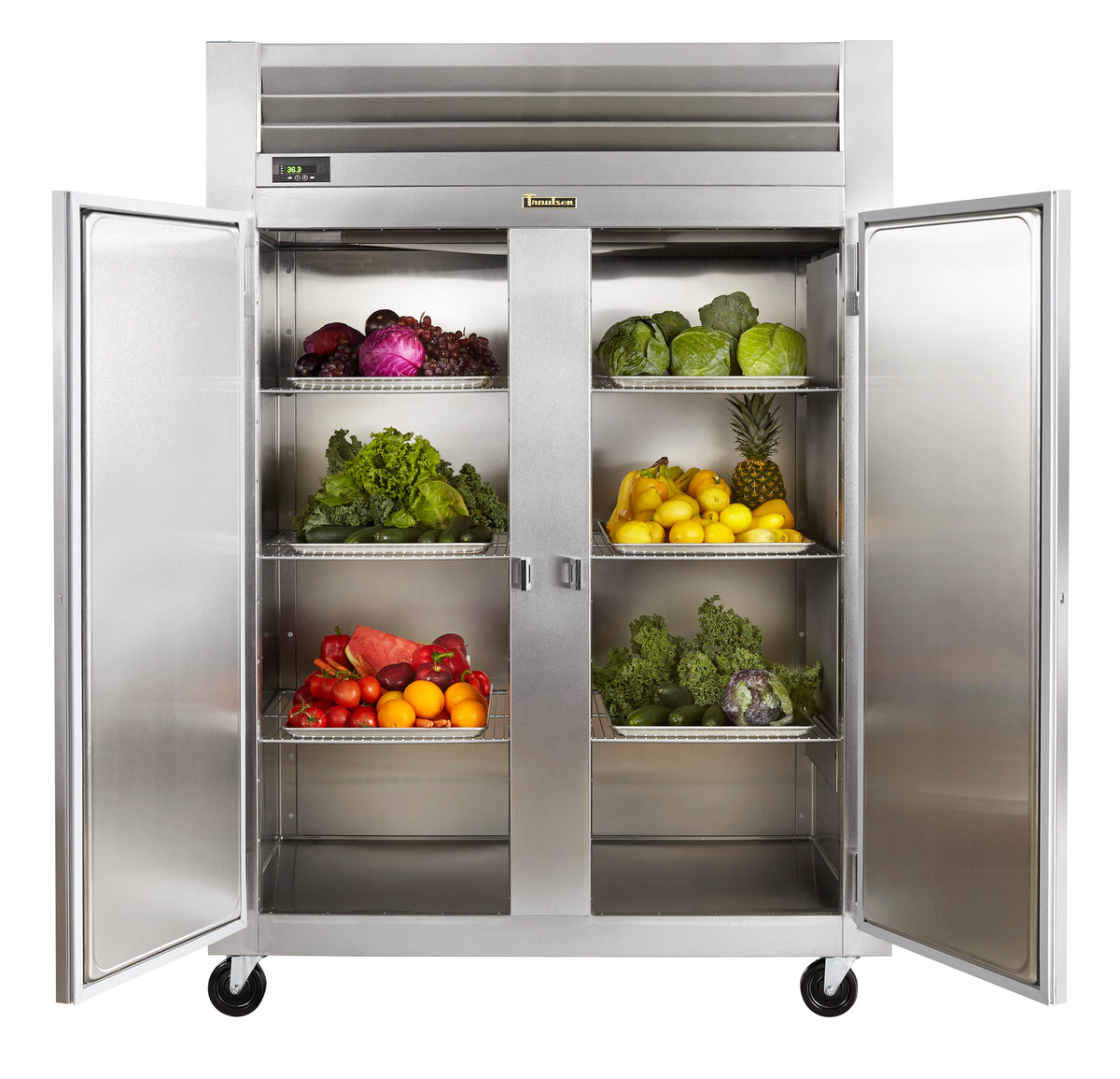 A large stainless steel commercial refrigerator with two doors open, showing shelves stocked with vegetables, fruits, and produce on a clean white background.
